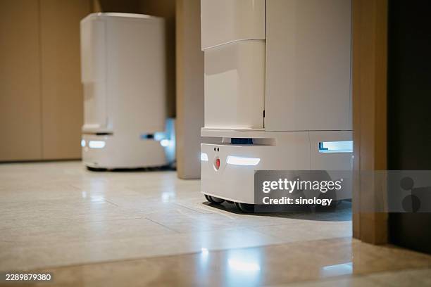 the room service robot in the hotel - contactless delivery stock pictures, royalty-free photos & images