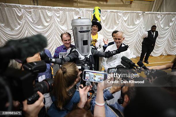 Jon Harvey, dressed as the satirical character Count Binface, speaks with members of the media following the declaration of the Clacton-on-Sea...
