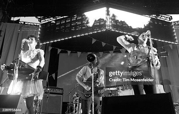 Regine Chassagne, Tim Kingsbury, and Win Butler of Arcade Fire perform during the Outside Lands Music & Arts festival at the Polo Fields in Golden...