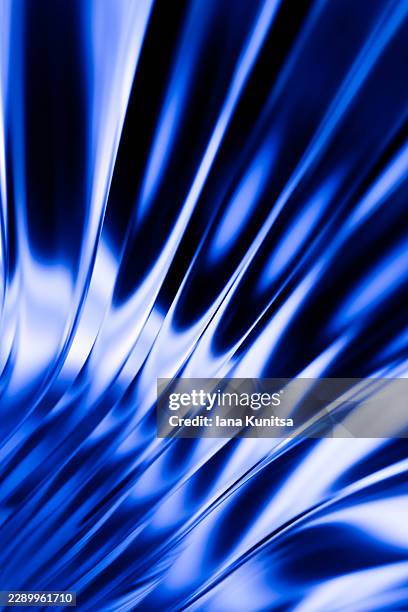 abstract glossy, glass dark blue flowing surface with smooth liquid waves, lines, reflective curves. futuristic 3d background fluid dynamics, digital technology, energy, motion, innovation, artificial intelligence, modern design, luxury abstract pattern. - fluid dynamics stock pictures, royalty-free photos & images