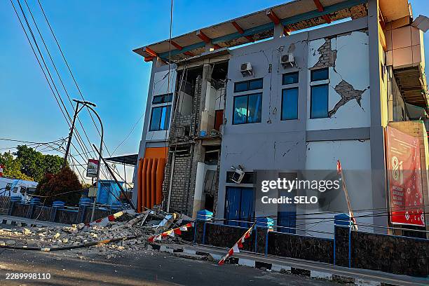 Damaged building is seen following a 7.7-magnitude earthquake in Ruteng, Manggarai, East Nusa Tenggara, on August 15, 2026. A strong 7.7-magnitude...