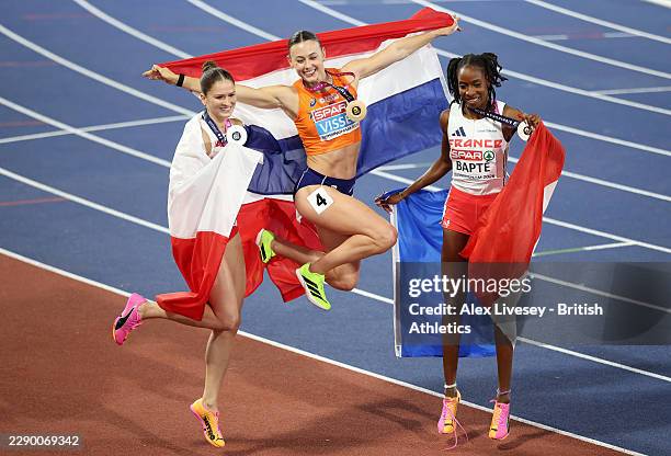 Silver medallist, Pia Skrzyszowska of Team Poland, gold medallist, Nadine Visser of Team Netherlands, and Laeticia Bapte of Team France, pose for a...