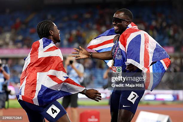 Gold medalist Romell Glave of Team Great Britain and Silver medalist Jeremiah Azu of Team Great Britain celebrate after the Men's 100 Metres Final...
