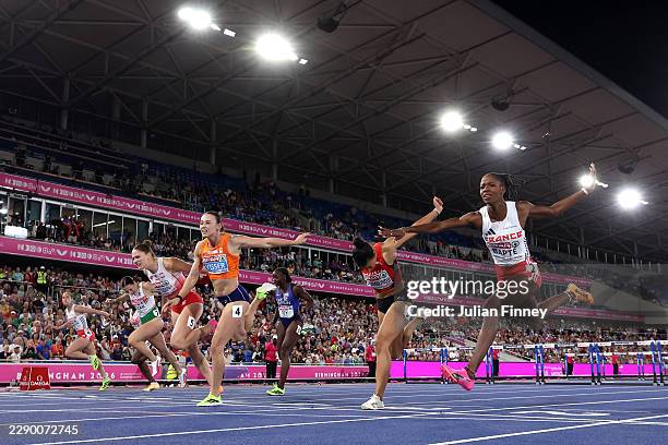 Nadine Visser of Team Netherlands crosses the finish line to win the gold medal ahead of Pia Skrzyszowska of Team Poland in the Women's 100 Metres...