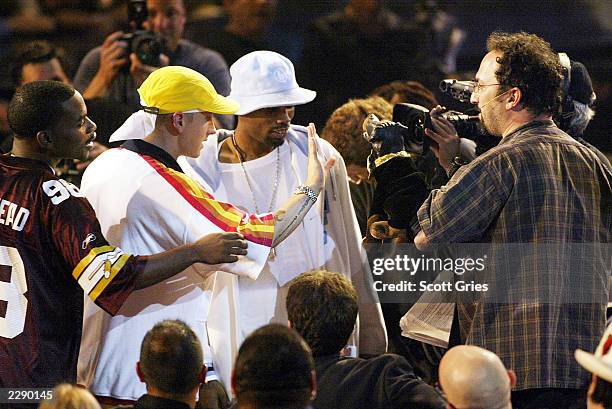 Eminem has a confrontaion with Triumph the Insult Comic Dog and Robert Smigel at the 2002 MTV Video Music Awards at Radio City Music Hall in New York...