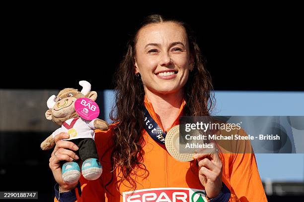 Gold medalist Nadine Visser of Team Netherlands poses for a photo during the medal ceremony for the Women's 100 Metres Hurdles Final during day three...