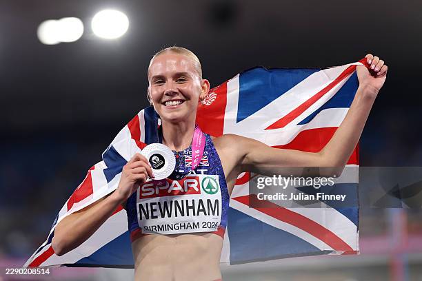 Silver medalist Emily Newnham of Team Great Britain poses for a photo with the national flag after the Women's 400 Metres Hurdles Final during day...