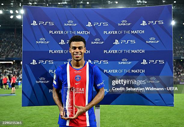 Desire Doue of Paris Saint-Germain poses for a photo with the PlayStation Player Of The Match award after the UEFA Super Cup 2026 match between Paris...