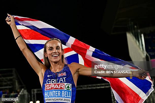 Gold medallist Britain's Georgia Hunter Bell celebrates after winning the women's 1500m final during the European Athletics Championships at...