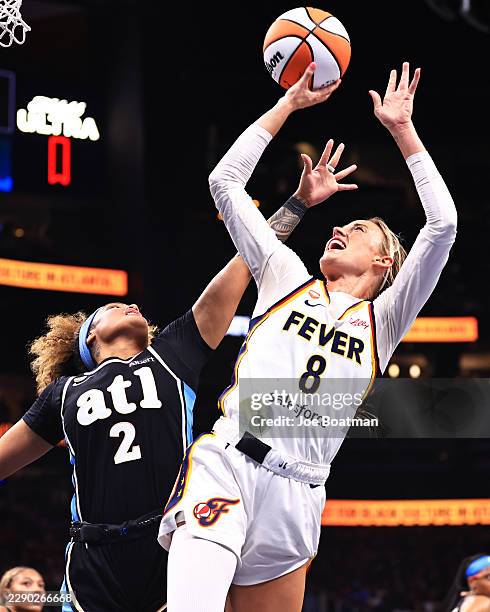 Sophie Cunningham of the Indiana Fever drives to the basket during the game against the Atlanta Dream on August 16, 2026 at State Farm Arena in...