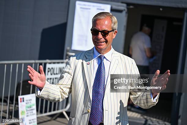 Reform UK leader Nigel Farage reacts after casting his vote during the Clacton By-election on August 13, 2026 in Clacton-on-Sea, England. The...
