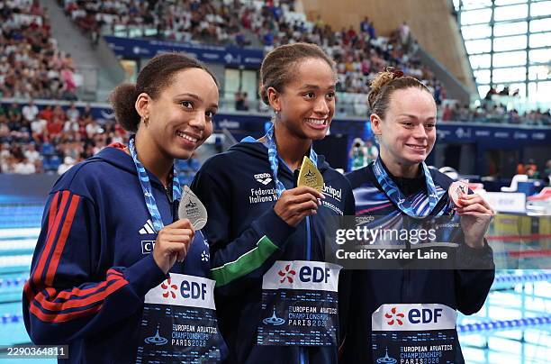 Gold medalist, Sara Curtis of Italy, Silver medalist, Mary-Ambre Moluh of France and Bronze medalist, Lauren Cox of Great Britain pose for a photo...