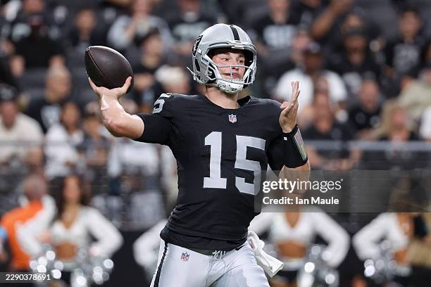 Fernando Mendoza of the Las Vegas Raiders looks to pass in the first quarter of a preseason game against the Arizona Cardinals at Allegiant Stadium...