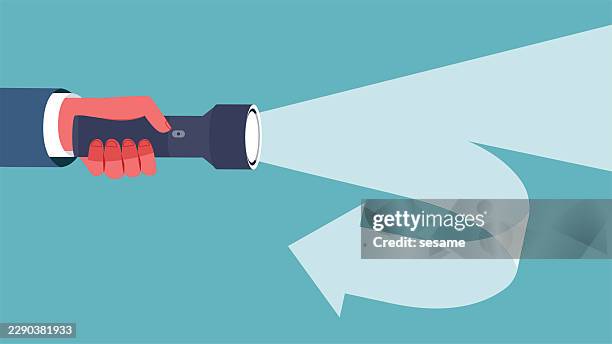 change direction, change thoughts, changes in guidance, advice or suggestions. the beam of the flashlight splits into two and changes direction - looking backwards stock illustrations