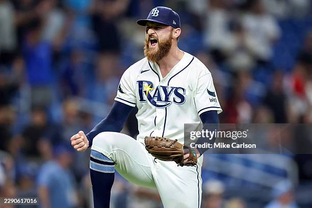 Bryan Baker of the Tampa Bay Rays celebrates his save against the Toronto Blue Jays after the baseball game at Tropicana Field on August 19, 2026 in...