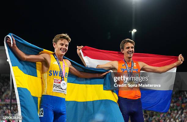 Gold medalist Stefan Nillessen of Team Netherlands and Silver medalist Samuel Pihlstroem of Team Sweden pose for a photo with their medals and...