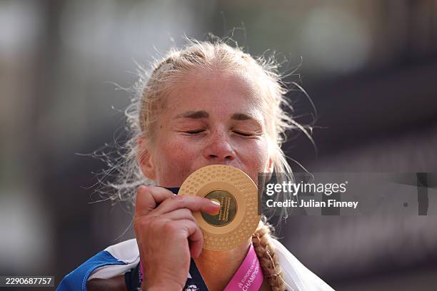 Gold medalist Alisa Vainio of Team Finland poses for a photo with her medal after victory in the Women's Marathon Final during day seven of the 27th...