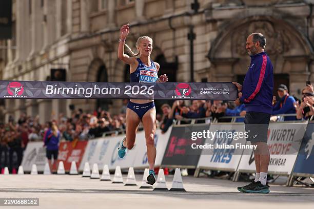 Alisa Vainio of Team Finland crosses the finish line to win the gold medal in the Women's Marathon Final during day seven of the 27th European...