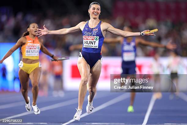 Amy Hunt of Team Great Britain celebrates as she crosses the finish line to win the gold medal in the Mixed 4x100 Metres Relay Final during day seven...