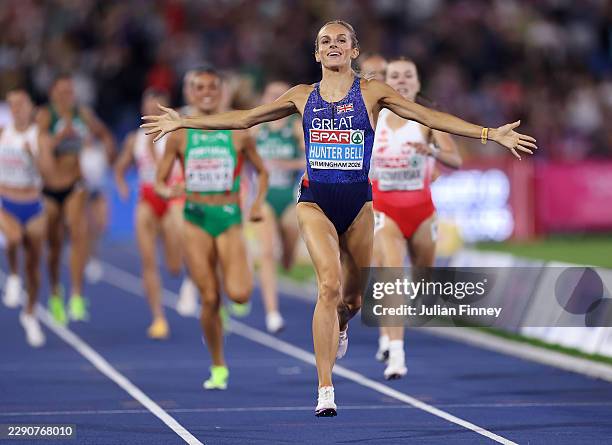 Georgia Hunter Bell of Team Great Britain celebrates as she crosses the finish line to win the gold medal in the Women's 1500 Metres Final during day...