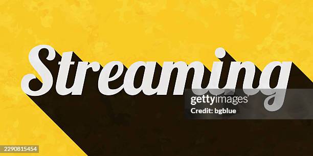streaming - text with long shadow on textured yellow background - paper streamer stock illustrations