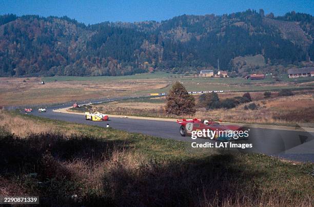 Masten Gregory drives the Autodelta SpA Alfa Romeo T33/TT/3 Alfa Romeo V8 during practice for the 1970 International Championship for Makes Austrian...