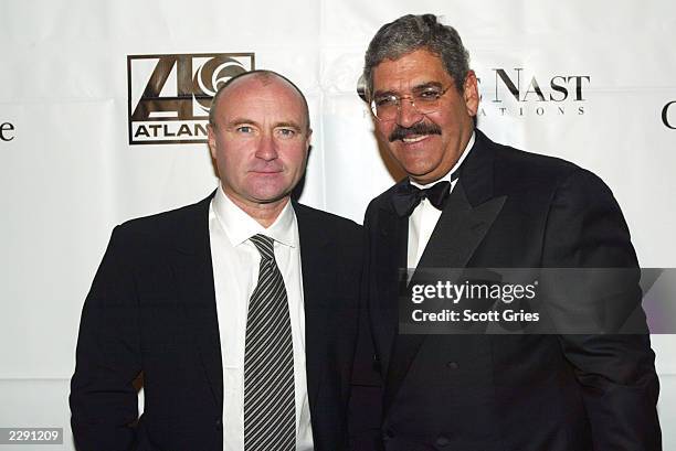 Phil Collins and Conde Nast CEO Steve Florio at the City of Hope Gala at Cipriani's on 42nd St. In New York City, November 13, 2002. Photo by Scott...