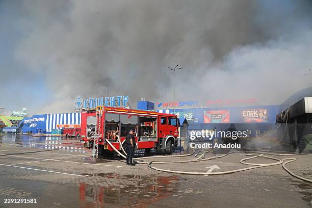 Firefighters work at a damaged warehouse facility following a Russian strike in the Odesa, Ukraine, on August 24, 2026. According to local...