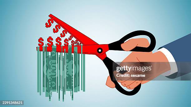 cut the budget or reduce spending; lower costs to increase profits; reduce tax rates or the debt burden. hold a pair of scissors with a dollar sign on the blades and cut the bill in half. - holding scissors stock illustrations