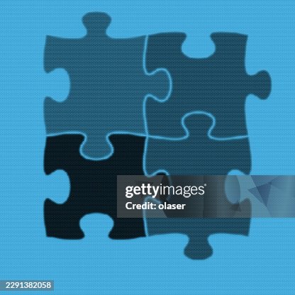 Four interlocking jigsaw puzzle pieces in blue and black sit centered on a textured blue background, creating a simple graphic composition with soft edges and high contrast. Four interlocking jigsaw puzzle pieces in blue and black sit centered on a textured blue background, creating a simple graphic composition with soft edges and high contrast.
