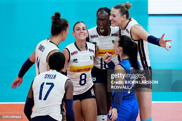 Italy's Alessia Orro celebrates with team mates during the Women's European Volleyball Championship EuroVolley Pool D match between France and Italy...