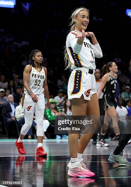 Sophie Cunningham of the Indiana Fever reacts after she is called for a foul in the first half against the New York Liberty at Barclays Center on...