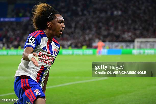 Lyon's Belgian forward Malick Fofana celebrates after scoring Lyon's first goal during the UEFA Champions League qualifying playoff - second leg...