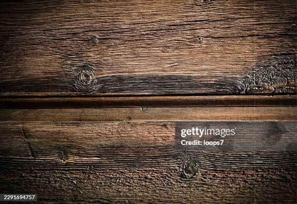 rustic weathered wooden planks texture background - barn wall stock illustrations