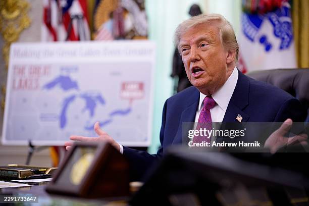 Map labeling Lake Ontario as "Lake America" is displayed as U.S. President Donald Trump speaks after signing an executive order during an event in...