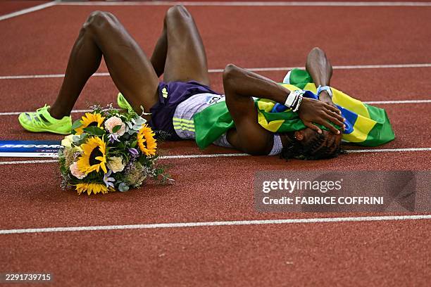 Brazil's Alison dos Santos celebrates after winning and breaking the world record in the men's 400m hurdles during the IAAF Diamond League athletics...