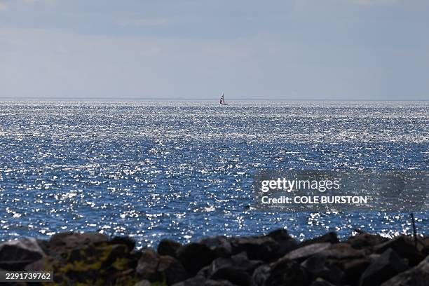 Sailboat is seen in the distance on Lake Ontario, from Toronto, Ontario, on August 27, 2026. US President Donald Trump announced that he is renaming...
