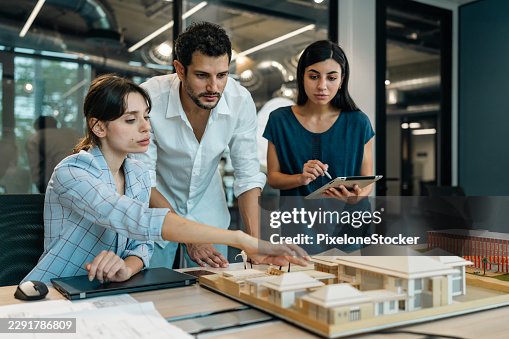 Architects team working on project plan. Architects team working on project plan.