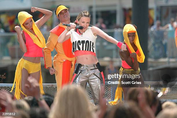 Kylie Minogue performs during MTV All Access Week on TRL at the MTV Beach House in Seaside Heights, New Jersey. 7/17/02 Photo by Scott Gries/Getty...