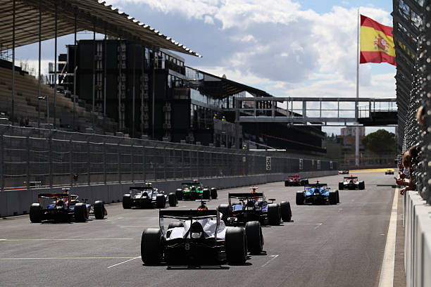 Theophile Nael of France and Campos Racing and a group of cars complete a practice start during day one of Formula 3 Testing at Madring on August 24,...