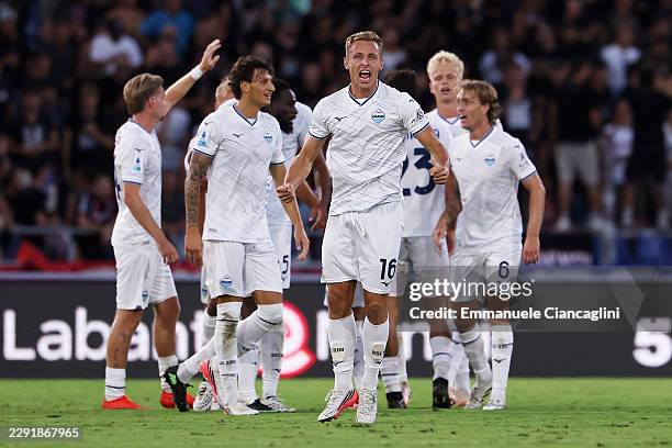 Davide Frattesi of Lazio celebrates scoring his team’s first goal with teammates during the Serie A match between Bologna FC and SS Lazio at Stadio...