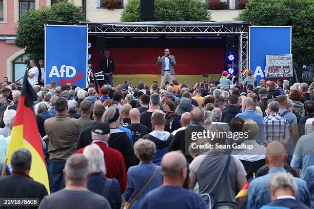 Joerg Urban, leader of the far-right Alternative for Germany in the state of Saxony, speaks to voters at an AfD campaign rally prior to state...