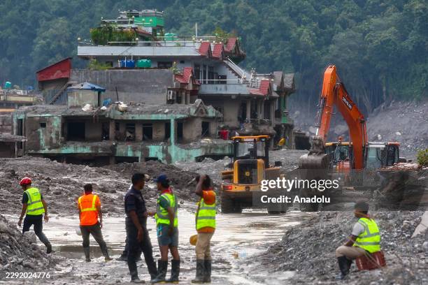Search operations continue at a town hit by the flash flood, amid increasing deaths and missing people, in Nuwakot, Nepal, on August 29, 2026. An...