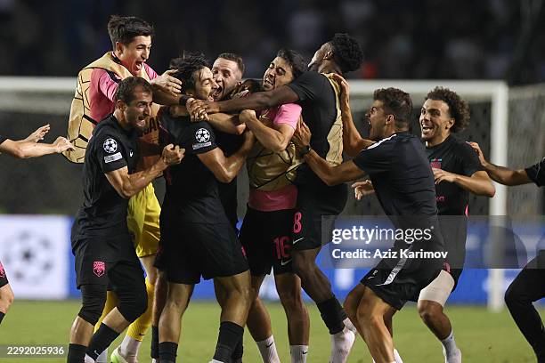 Tellur Mutallimov of Sabah celebrates a goal with teammates during the UEFA Champions League 2026/27 Play-offs 2nd leg between Sabah and H....