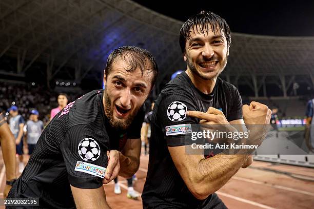 Abdulakh Khaibulaev and Tellur Mutallimov of Sabah show the Champions League pin after winning the UEFA Champions League 2026/27 Play-offs 2nd leg...