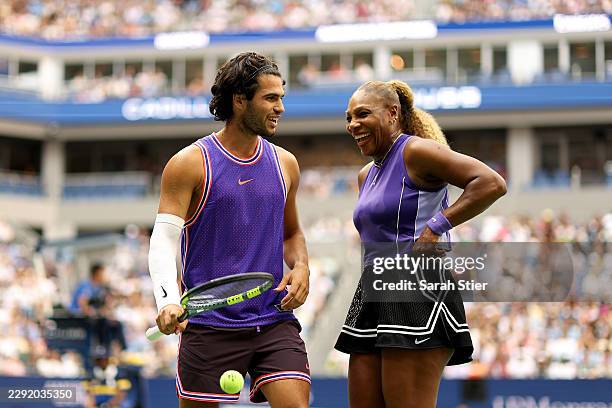 Carlos Alcaraz of Spain reacts with partner Serena Williams of the United States in their mixed doubles match against Erin Routliffe of New Zealand...