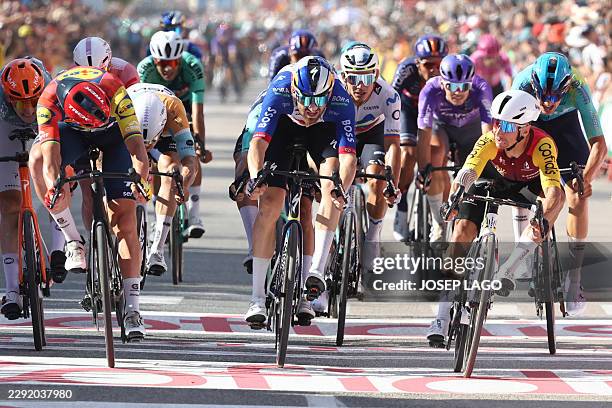 Team Cofidis' French rider Bryan Coquard crosses the finish line to win the eighth stage of the Vuelta a Espana 2026, a 171 km race between Pucol and...