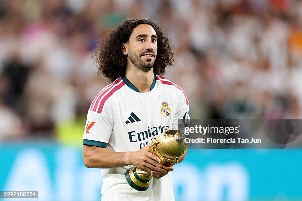 Marc Cucurella of Real Madrid presents the FIFA World Cup trophy to the fans before the LaLiga EA Sports 2026/27 match between Real Madrid and Real...