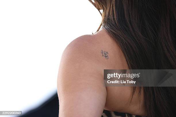 Sandra Bullock, tattoo detail, attends the "Practical Magic 2" European Premiere at Odeon Luxe Leicester Square on August 26, 2026 in London, England.