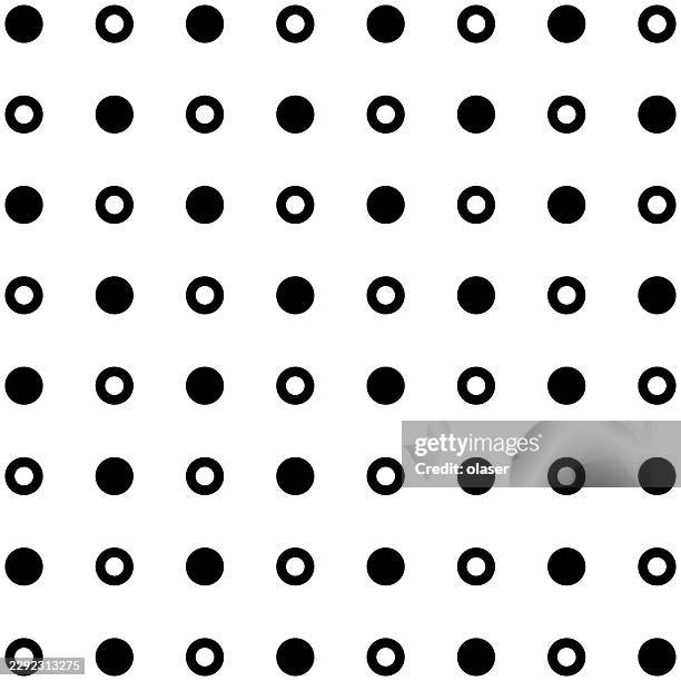 black circular dots and ring shapes repeat in a neat grid across a white background, creating a simple monochrome pattern with strong contrast and regular spacing. - clothes flat lay stock illustrations